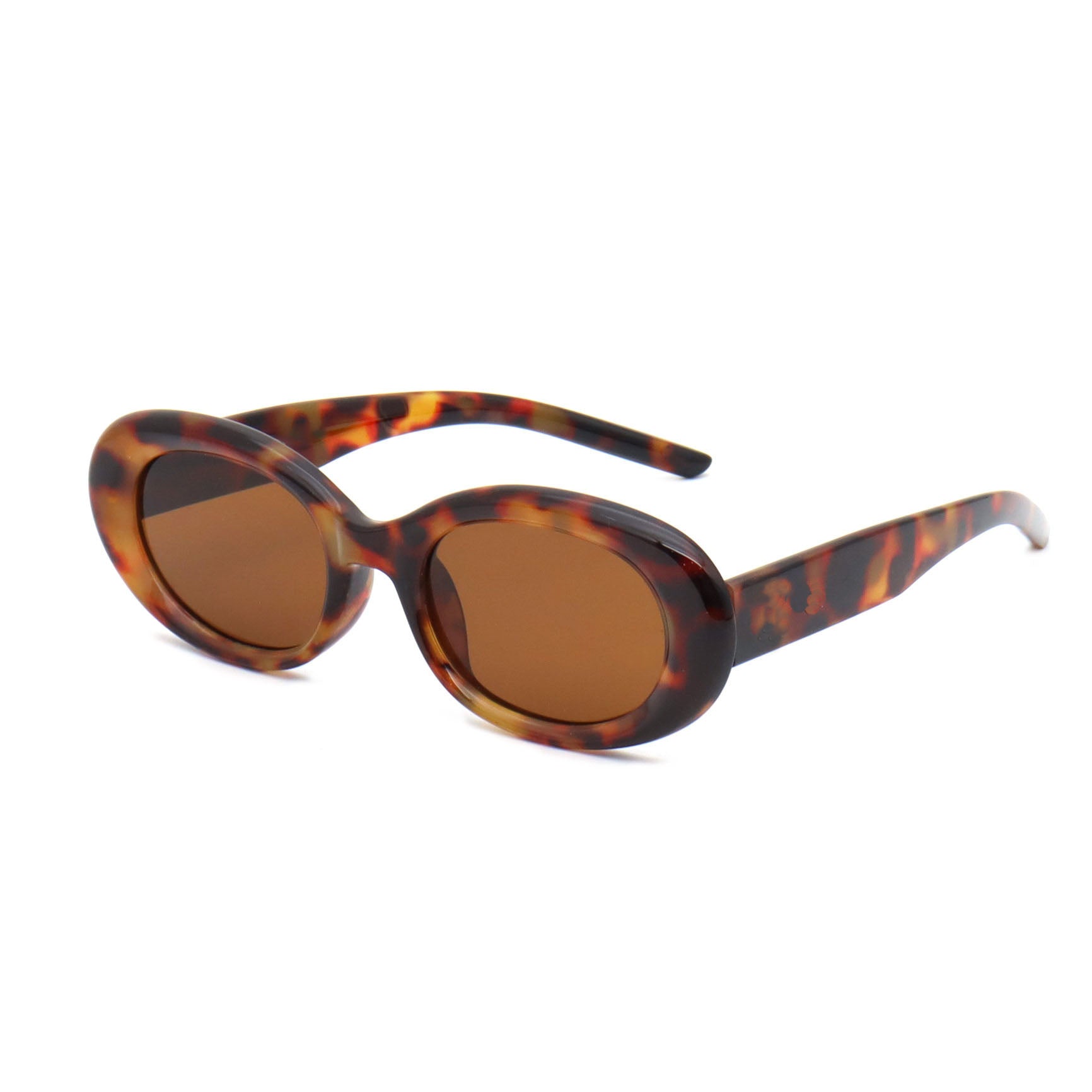 Sunglasses with tortoiseshell frame and brown lenses on a white background
